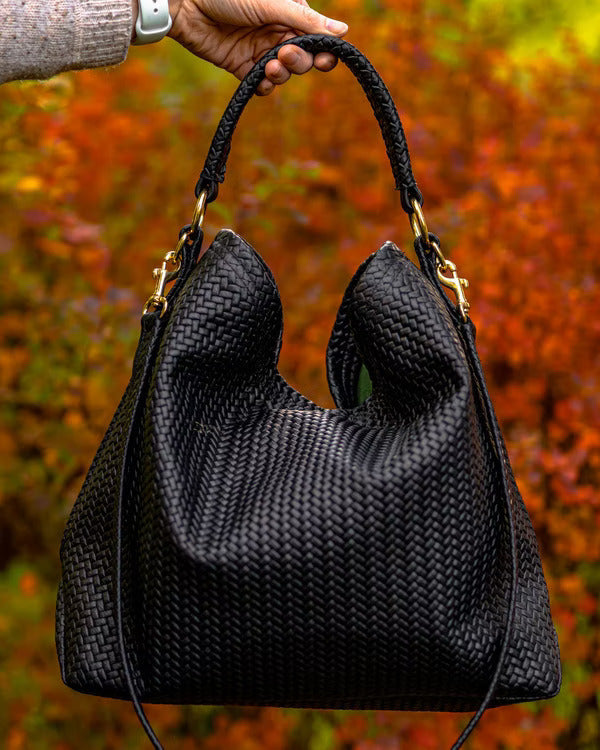 Handmade Woven Original Leather Bag in black, showcasing intricate weaving and durable metal hardware.