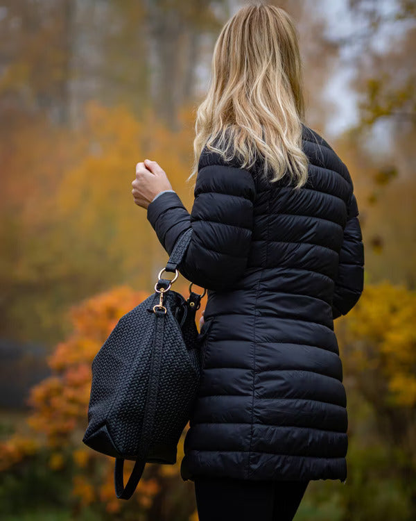 Handmade Woven Original Leather Bag in black, showcasing intricate weaving and durable metal hardware.