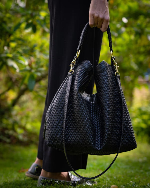 Handmade Woven Original Leather Bag in black, showcasing intricate weaving and durable metal hardware.