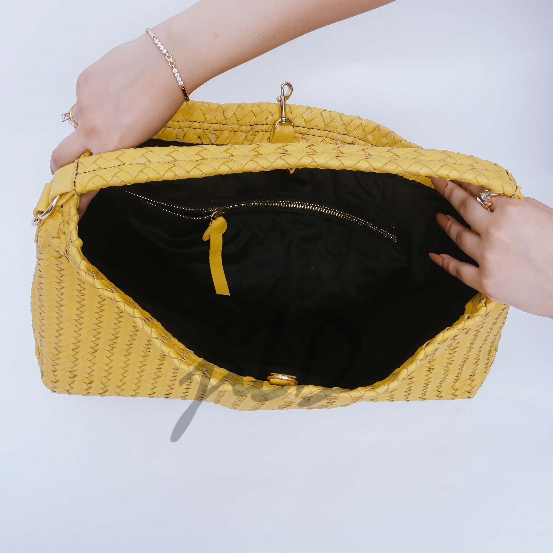 Handmade Woven Original Leather Bag in Yellow, showcasing intricate weaving and a stylish design with a top handle and detachable shoulder strap.