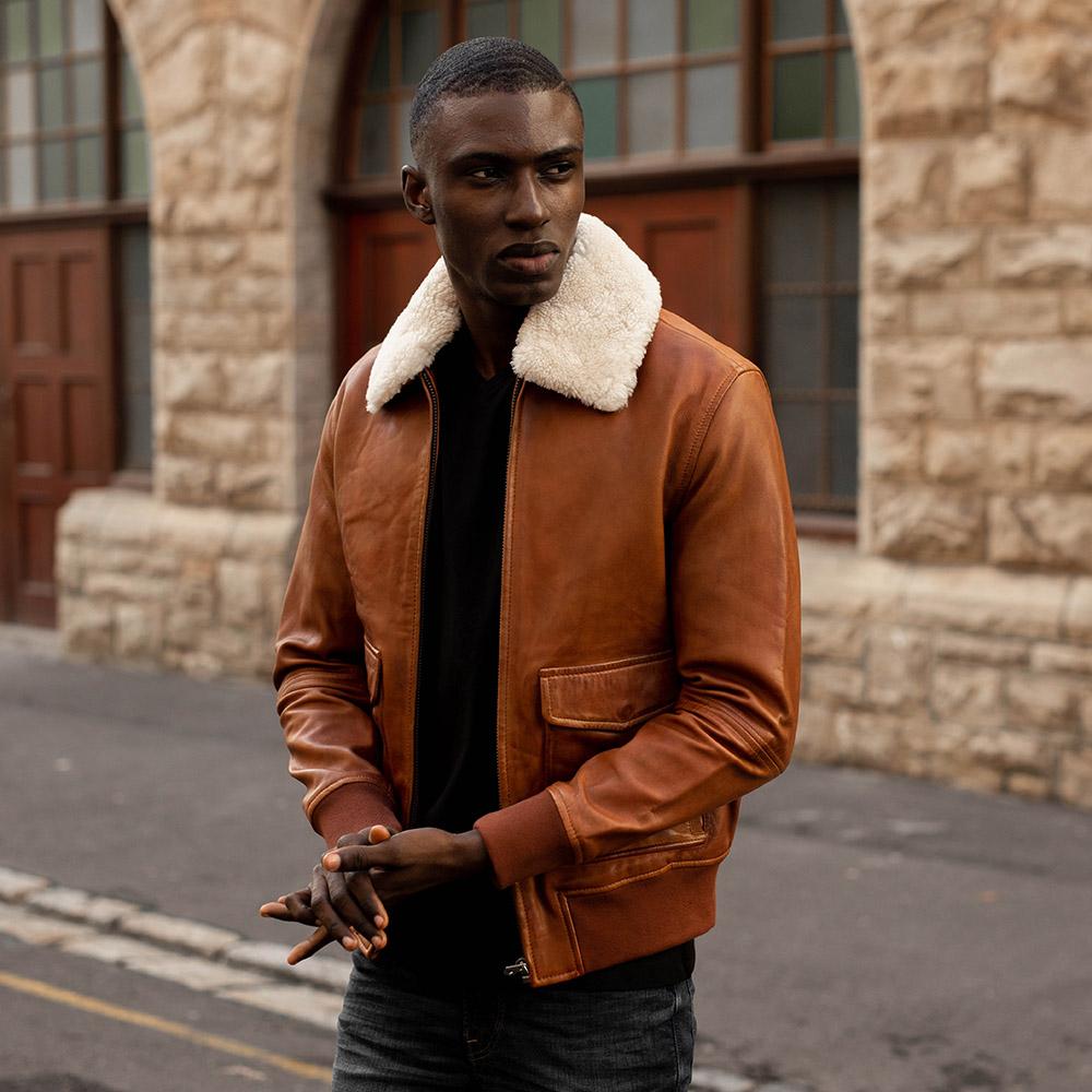 Harry Bomber Jacket in Chestnut color, featuring a classic cut, cold-defying collar, and multiple pockets for convenience.