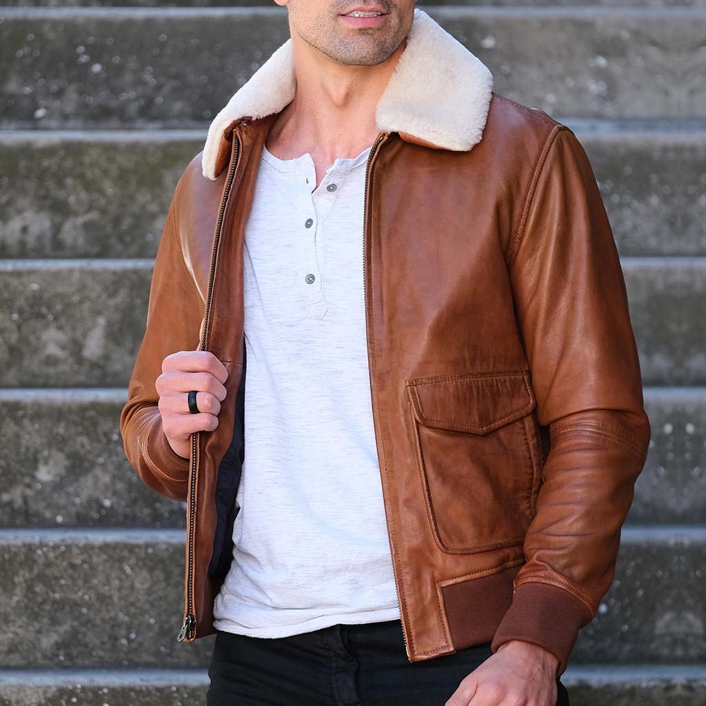 Harry Bomber Jacket in Chestnut color, featuring a classic cut, cold-defying collar, and multiple pockets for convenience.