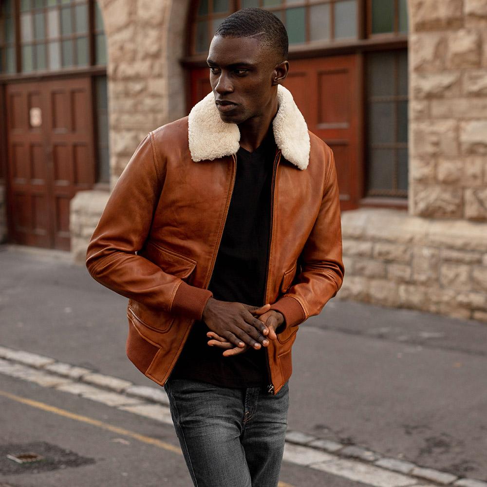 Harry Bomber Jacket in Chestnut color, featuring a classic cut, cold-defying collar, and multiple pockets for convenience.