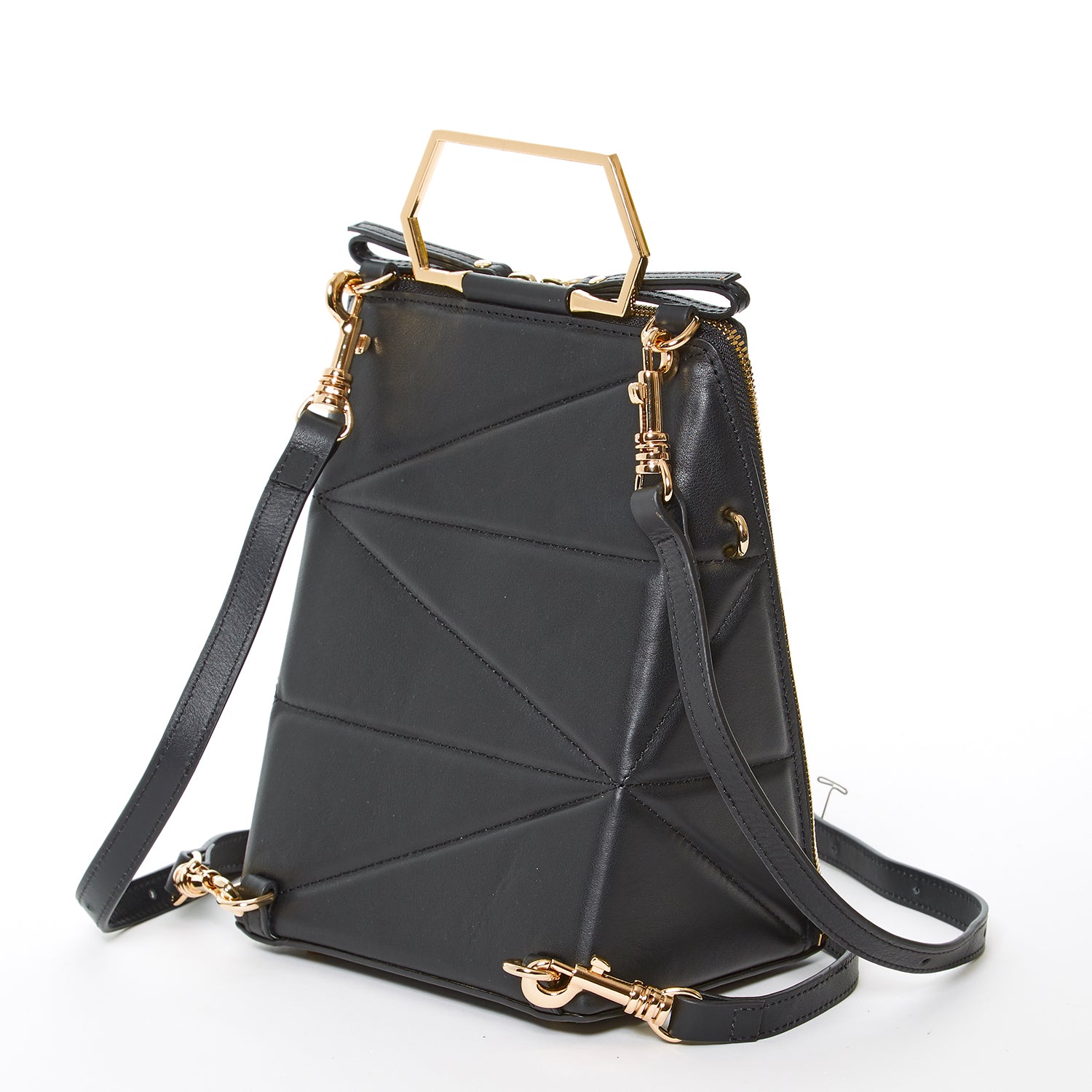 Heidi Black Leather Backpack Purse showcasing its stylish design, gold hardware, and teal interior.