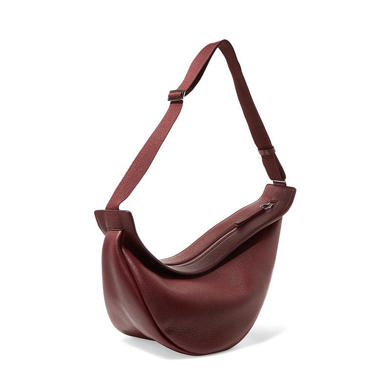 High Quality Casual Catwalk Style Shoulder Bag in crescent shape, made of durable PU fabric with a zipper opening.