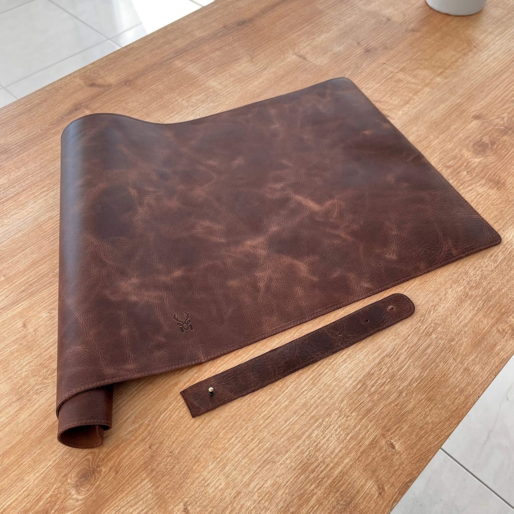 Hobart Genuine Leather Luxury Desk Mat showcasing its elegant design and smooth surface, perfect for enhancing any workspace.