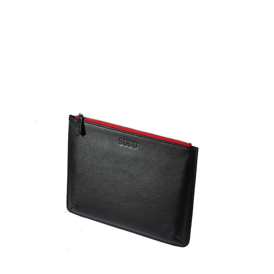 Elegant black leather iPad clutch case with pebbled texture, designed to protect and stylishly carry your iPad.