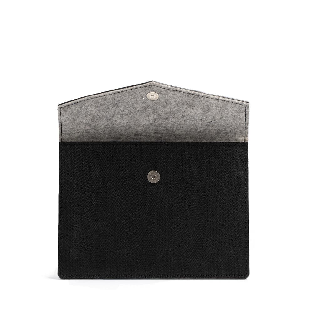 Stylish iPad Leather Sleeve featuring a unique snake print design, handcrafted from premium Italian leather with geometric patterns.