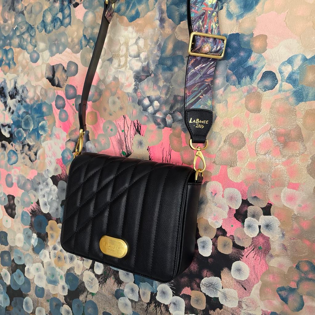 Iris Shoulder Bag in Black featuring artistic straps and eco-friendly materials, perfect for stylish women.