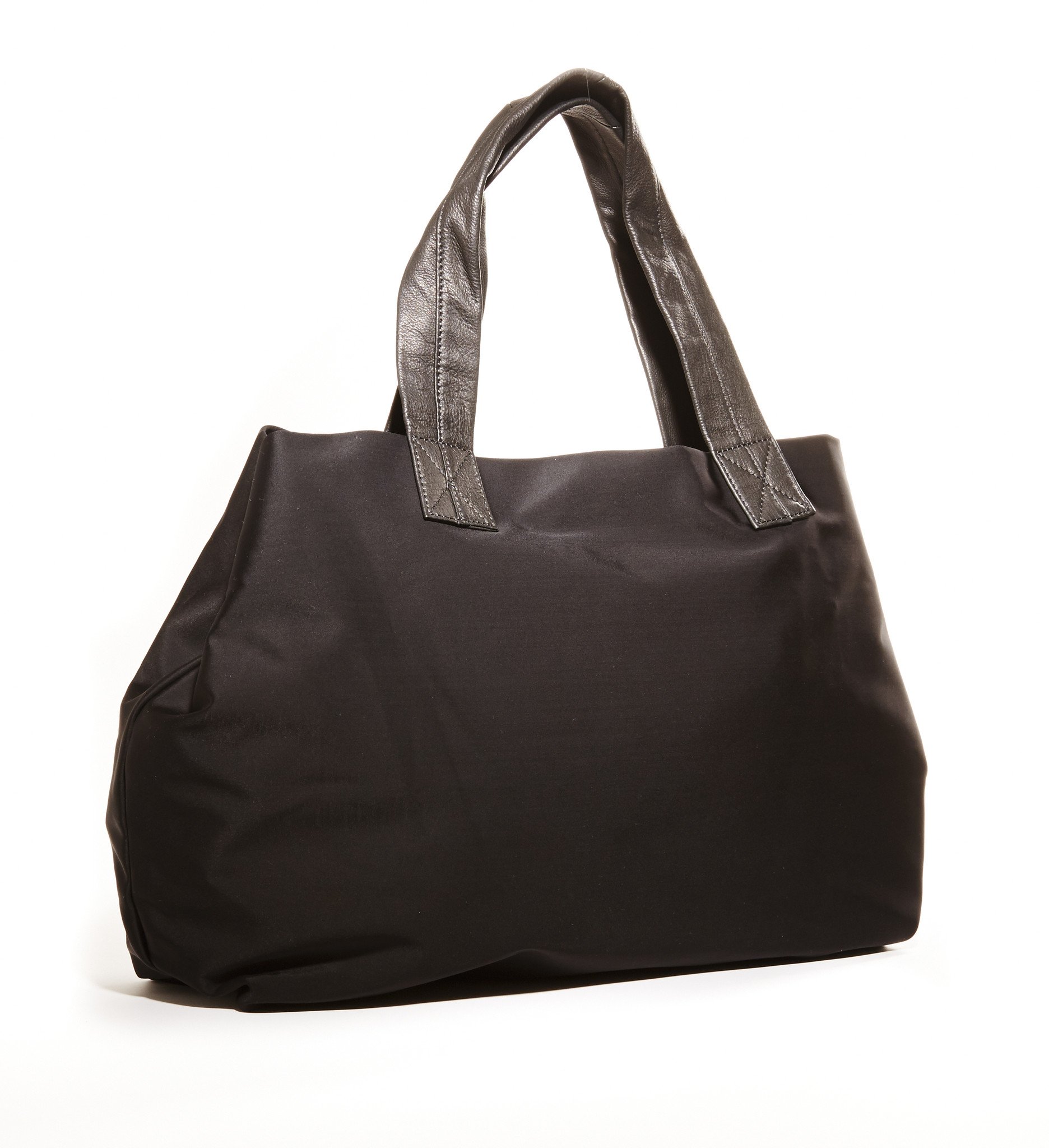 Jacki Easlick Black Basic Travel Tote featuring cowhide leather trim and waterproof nylon material, perfect for stylish travel.