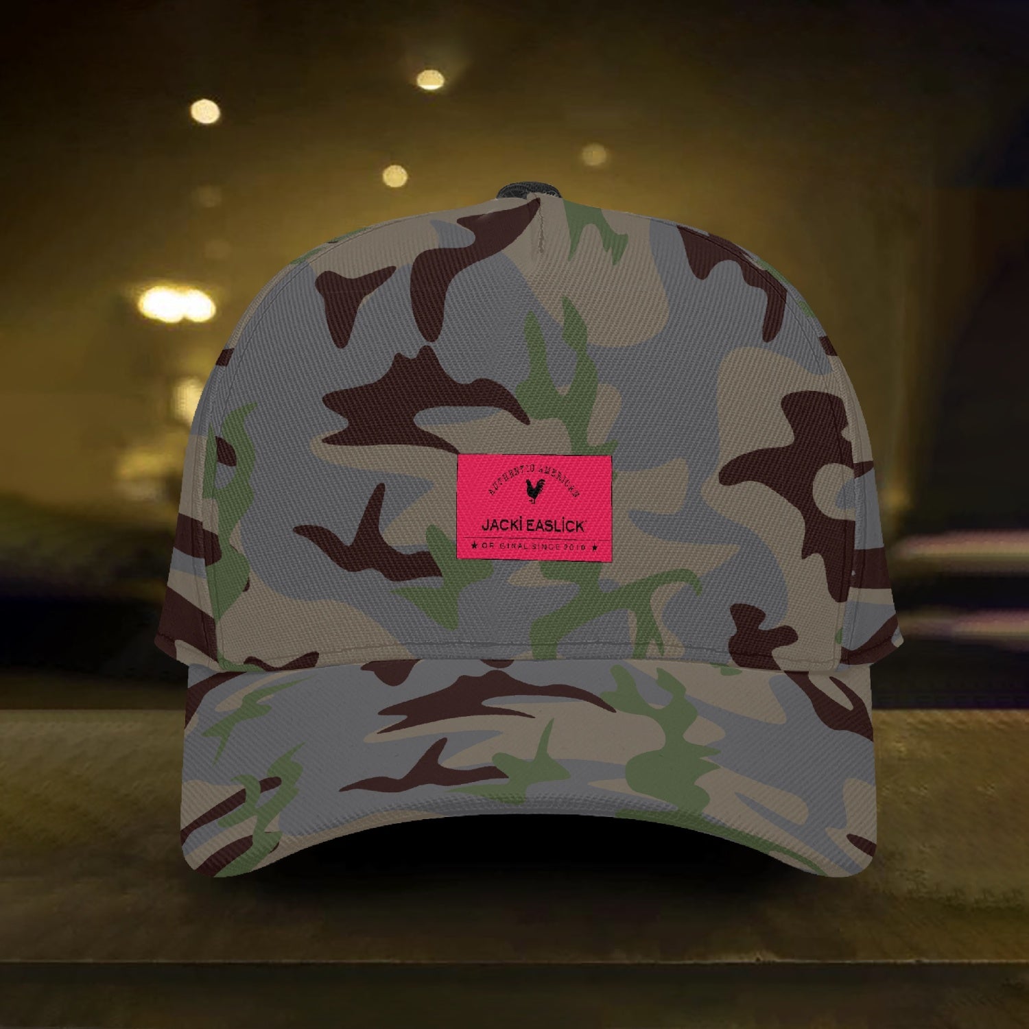 Jacki Easlick Chic Camo Hat featuring a stylish camouflage pattern, structured fit, and flat bill design, suitable for unisex wear.