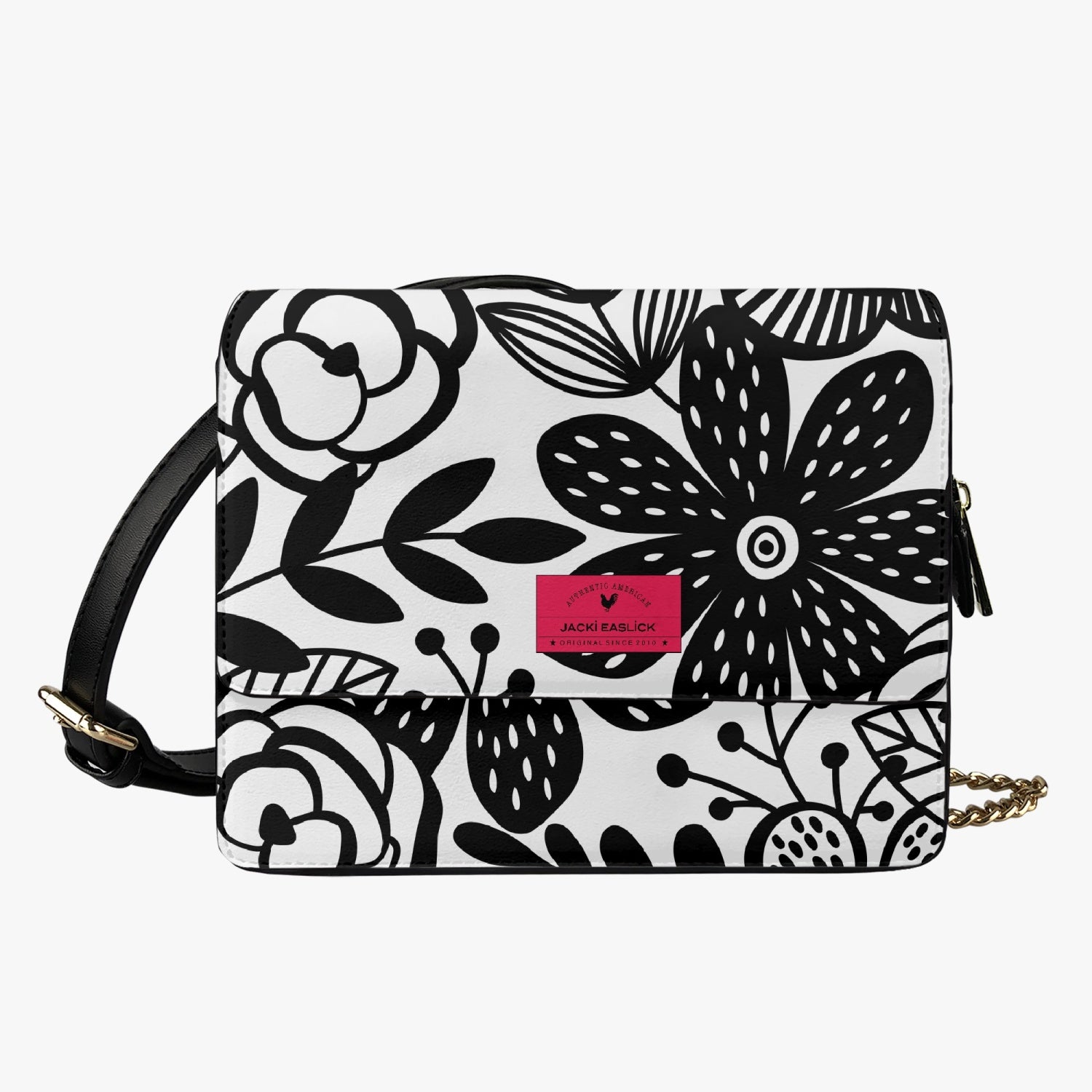 Jacki Easlick Happy Flowers Flap Handbag made of leather, featuring a floral design, adjustable strap, and magnetic closure.