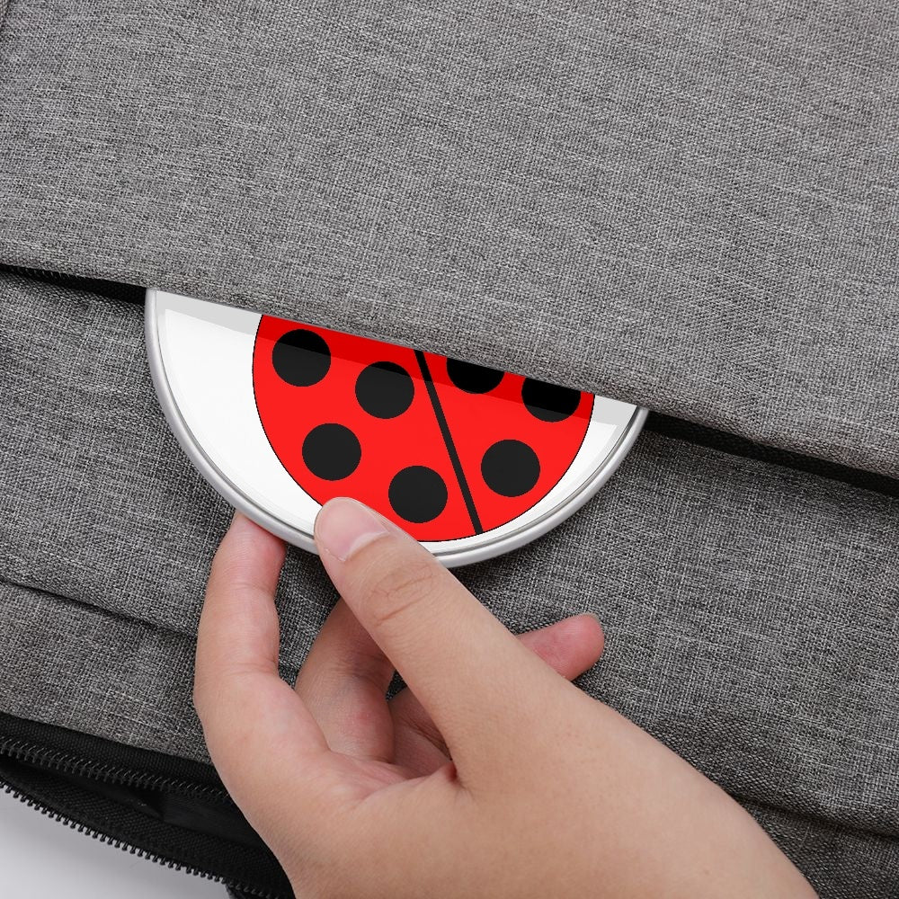 Jacki Easlick Ladybug 10W Wireless Charger featuring a cute ladybug design, compact size, and made from durable plastic and aluminum materials.