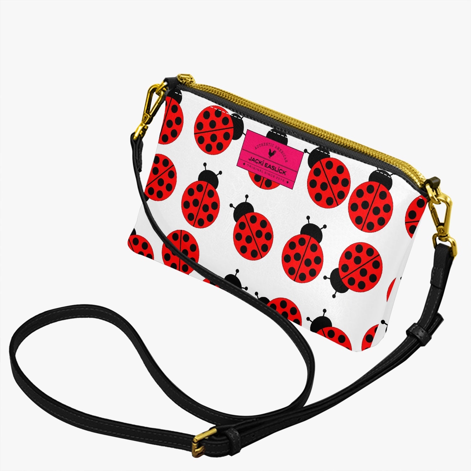 Jacki Easlick Ladybug Small Wristlet Clutch in leather with detachable straps, perfect for essentials.