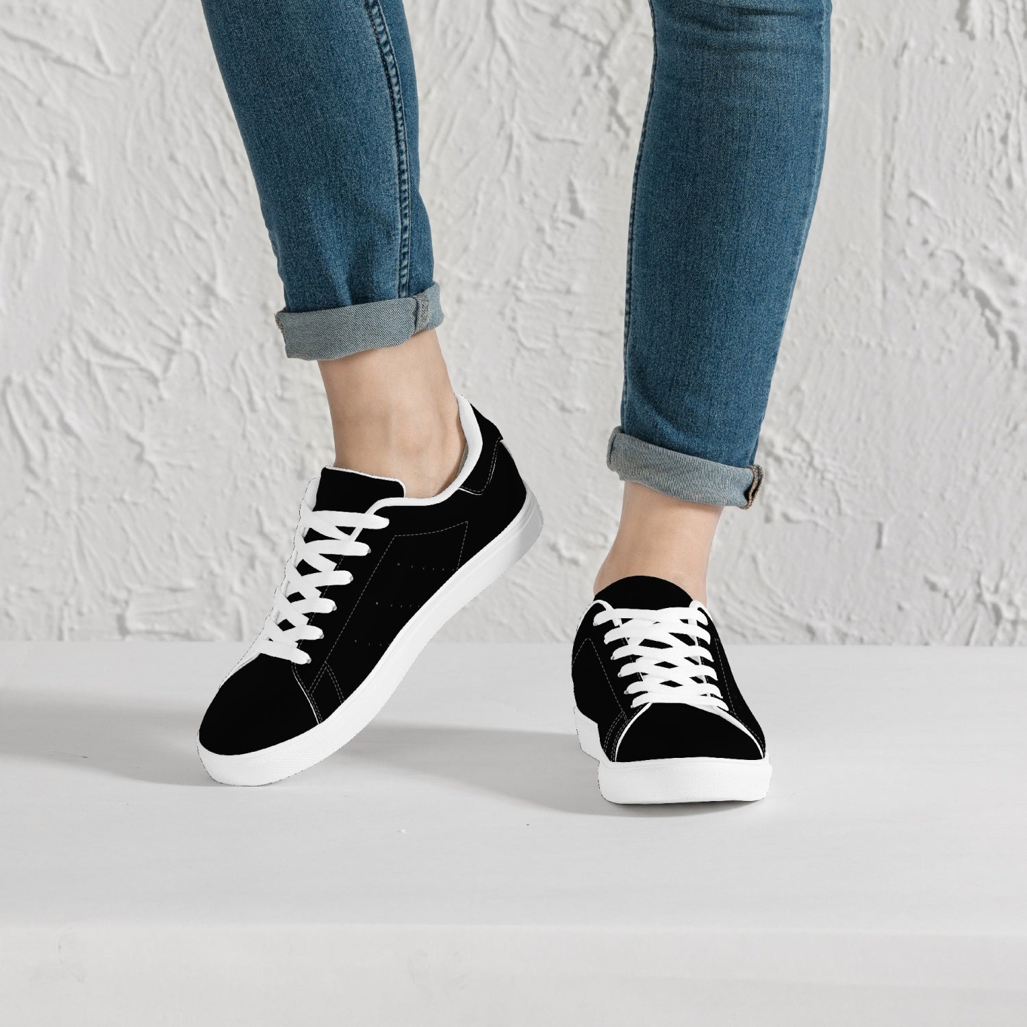 Jacki Easlick Lux Egg Low-Top Leather Sneakers featuring an all-over-print leather upper and classic lace-up design.