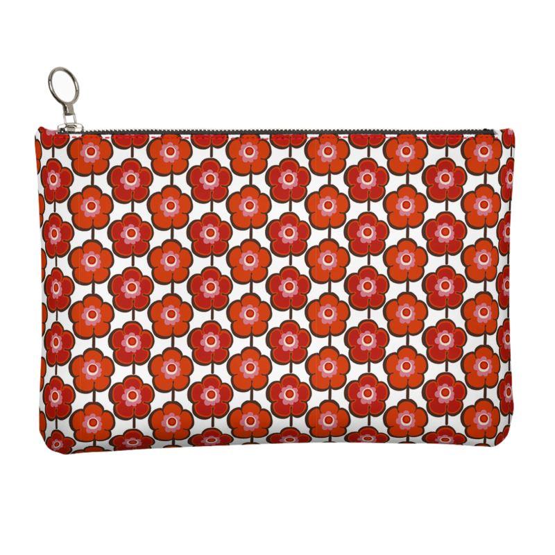 Jacki Easlick Poppy Print Leather Clutch showcasing vibrant poppy design and zip closure.