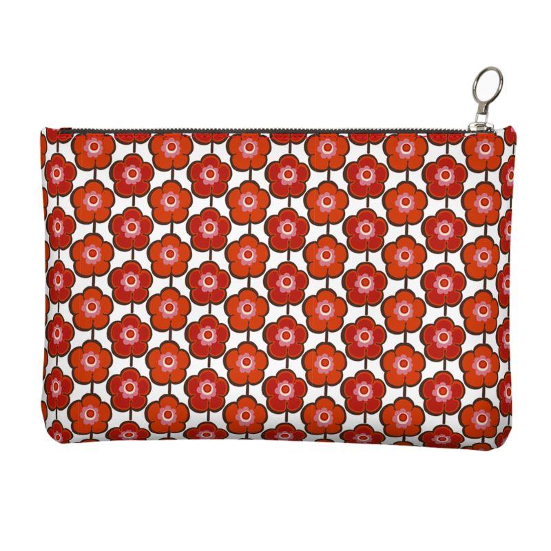 Jacki Easlick Poppy Print Leather Clutch showcasing vibrant poppy design and zip closure.