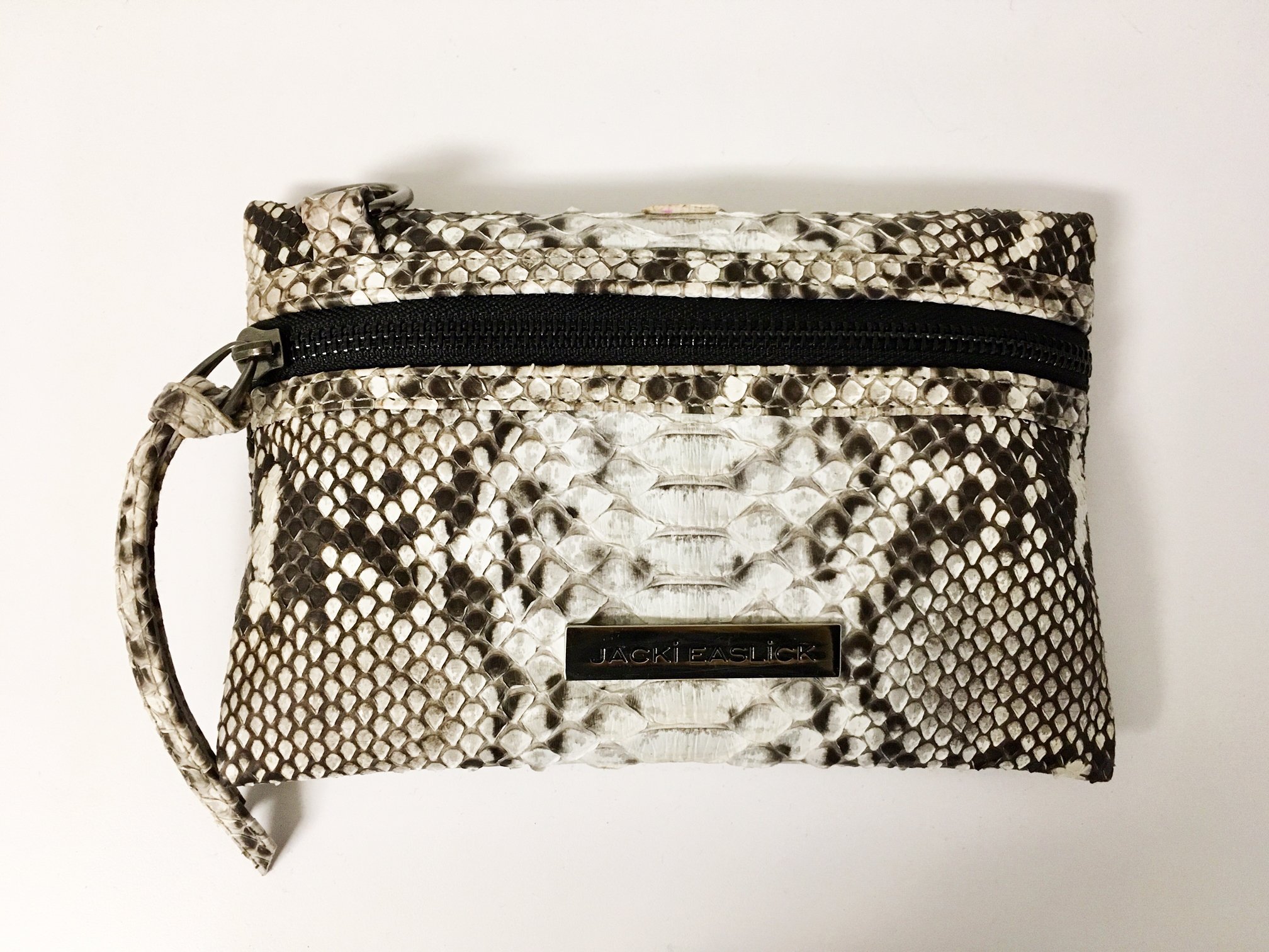 Jacki Easlick Real Python Mini Crossbody bag in natural color with detachable strap and front zip pocket.