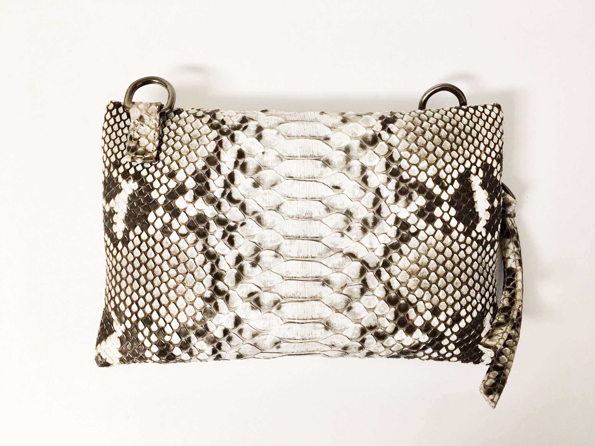 Jacki Easlick Real Python Mini Crossbody bag in natural color with detachable strap and front zip pocket.