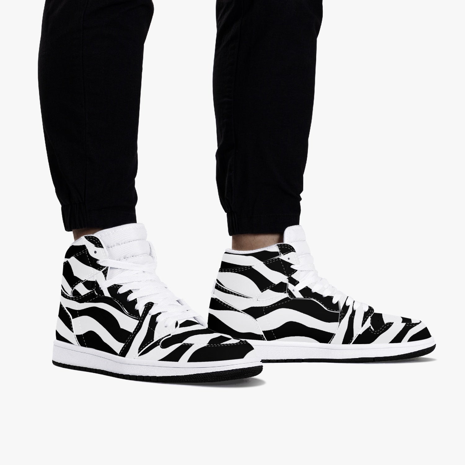 Jacki Easlick Zebra High-Top Leather Sneakers showcasing a stylish zebra print design with a durable leather upper.