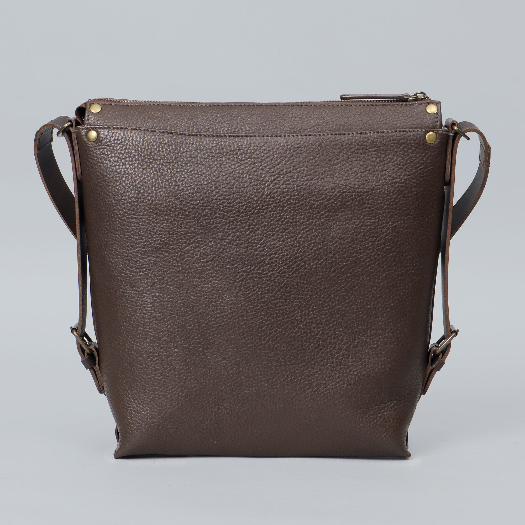 Jersey Leather Crossbody Bag showcasing premium full grain leather, adjustable strap, and multiple pockets for organization.