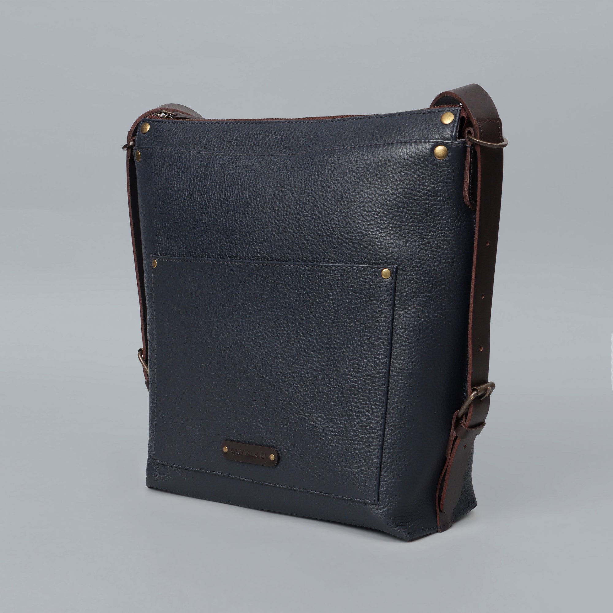 Jersey Leather Crossbody Bag showcasing premium full grain leather, adjustable strap, and multiple storage compartments.