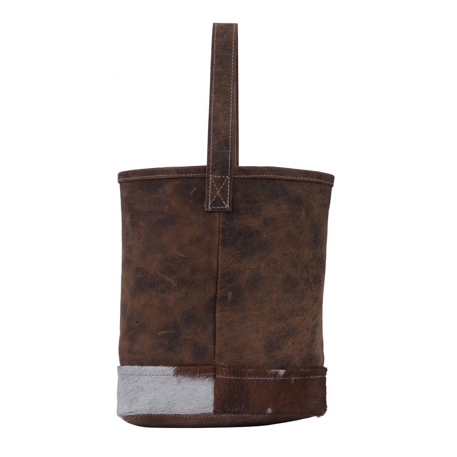 Handmade leather bottle cover with hairon material and strong handle, showcasing unique craftsmanship.