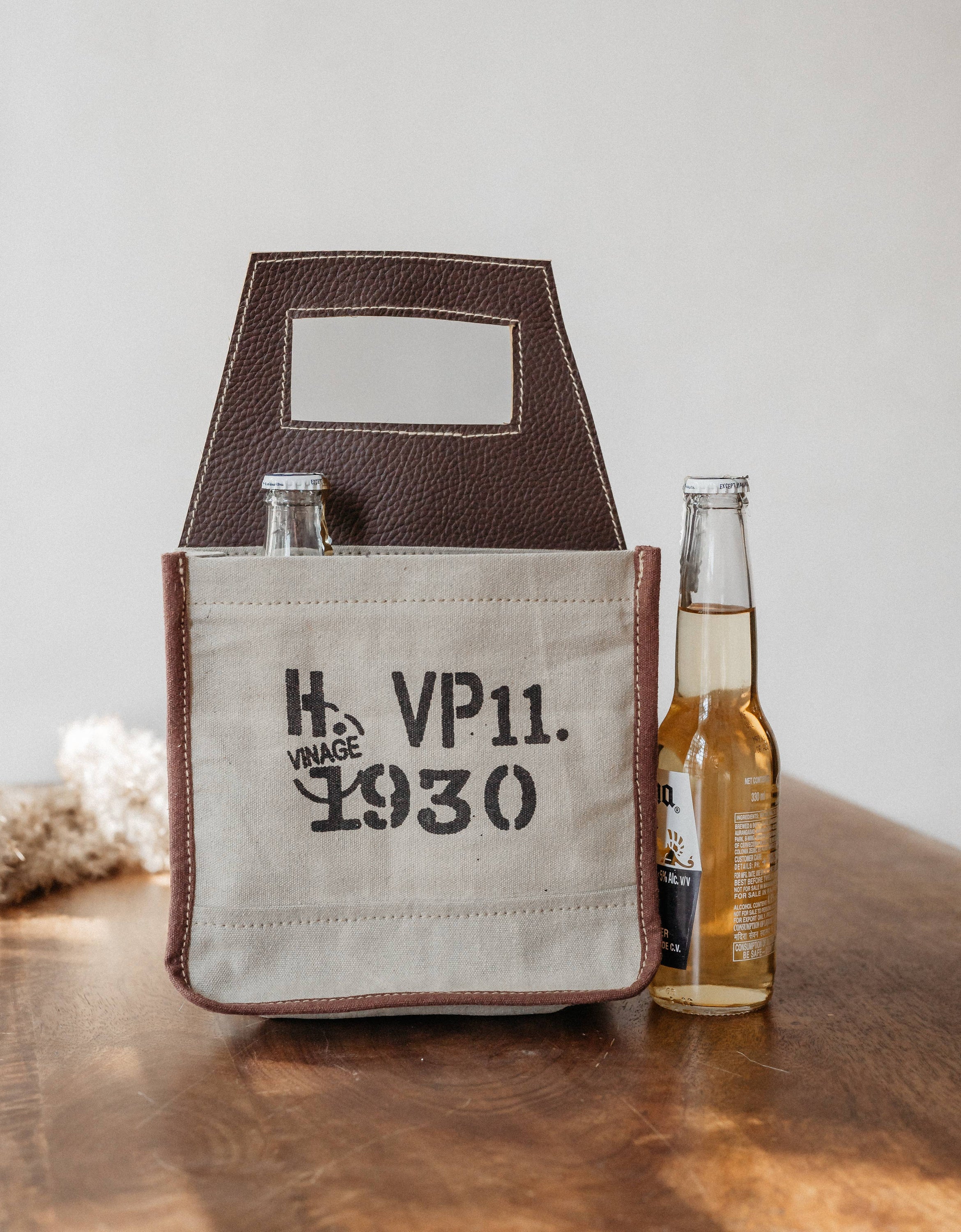 JH-1705 leather bottle holder with vintage print, showcasing its elegant design and quality materials.