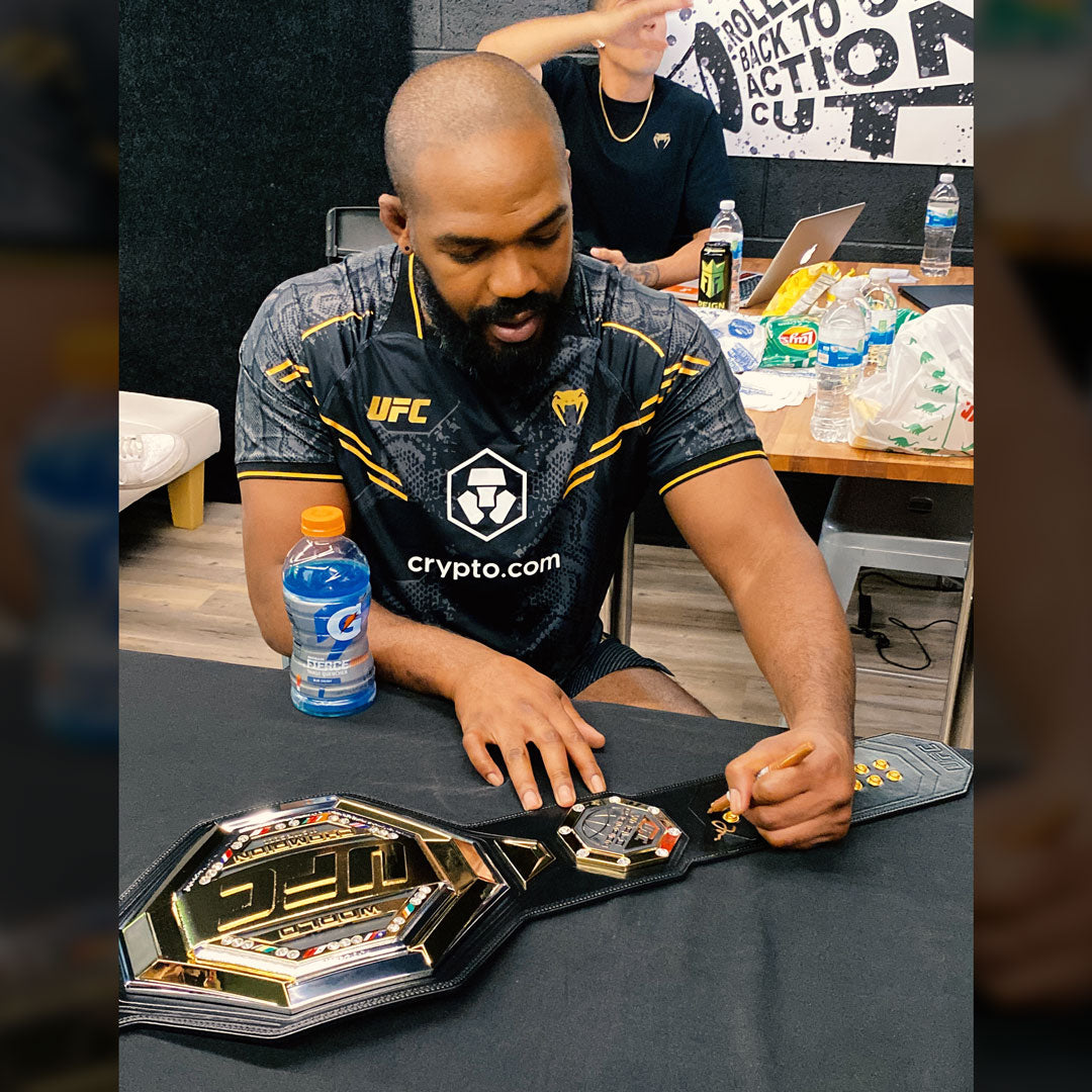 Jon Jones Signed UFC Legacy Championship Replica Belt, showcasing intricate details and Jon Jones' autograph.