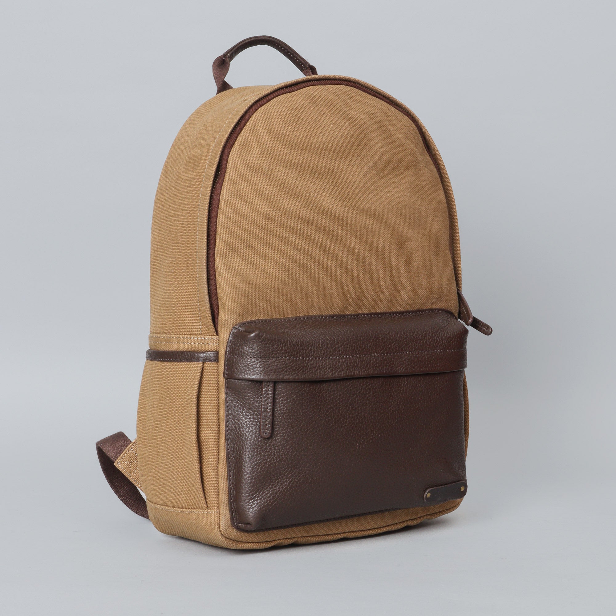 Journey Canvas Backpack featuring padded laptop section, multiple pockets, and durable water-resistant material.