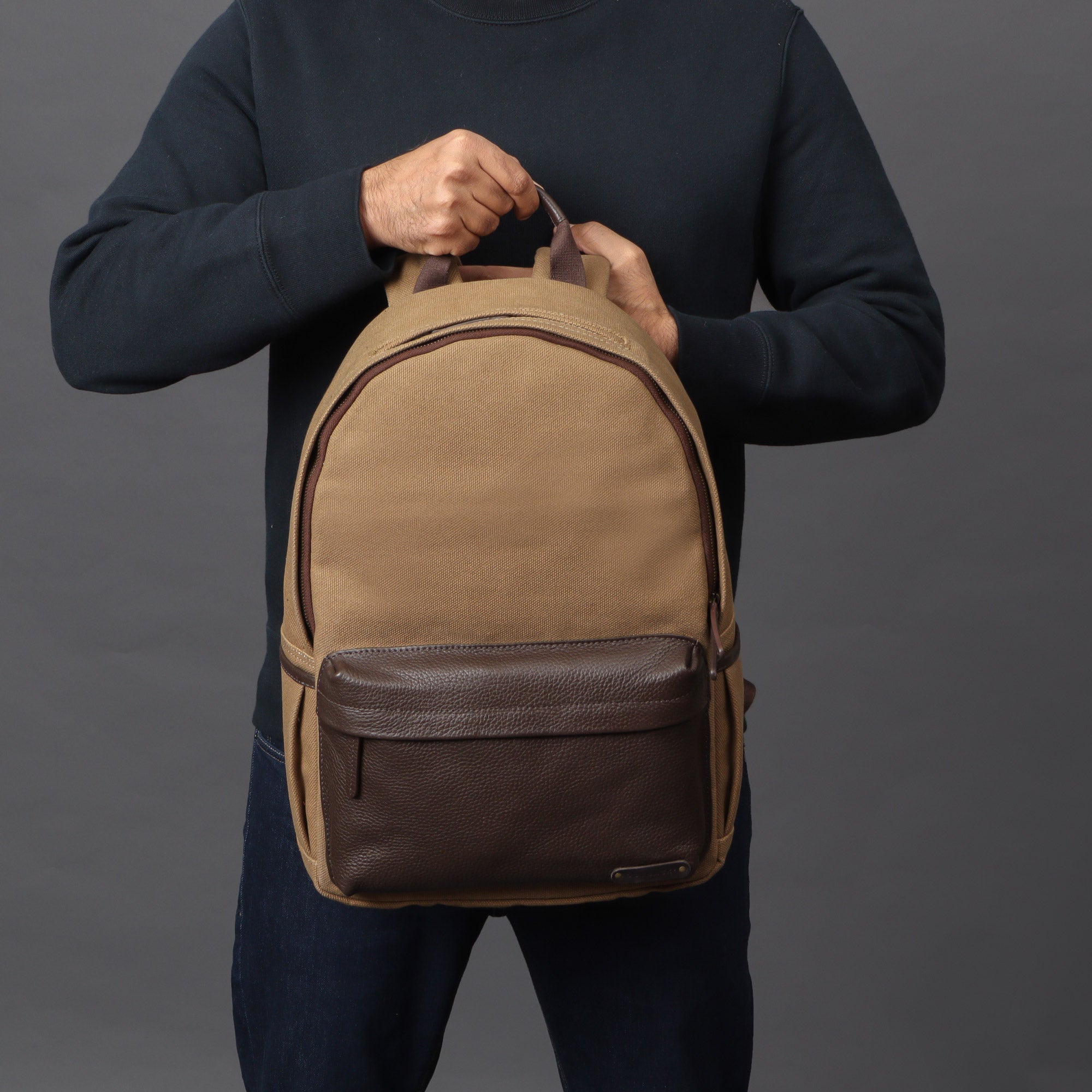 Journey Canvas Backpack featuring padded laptop section, multiple pockets, and durable water-resistant material.