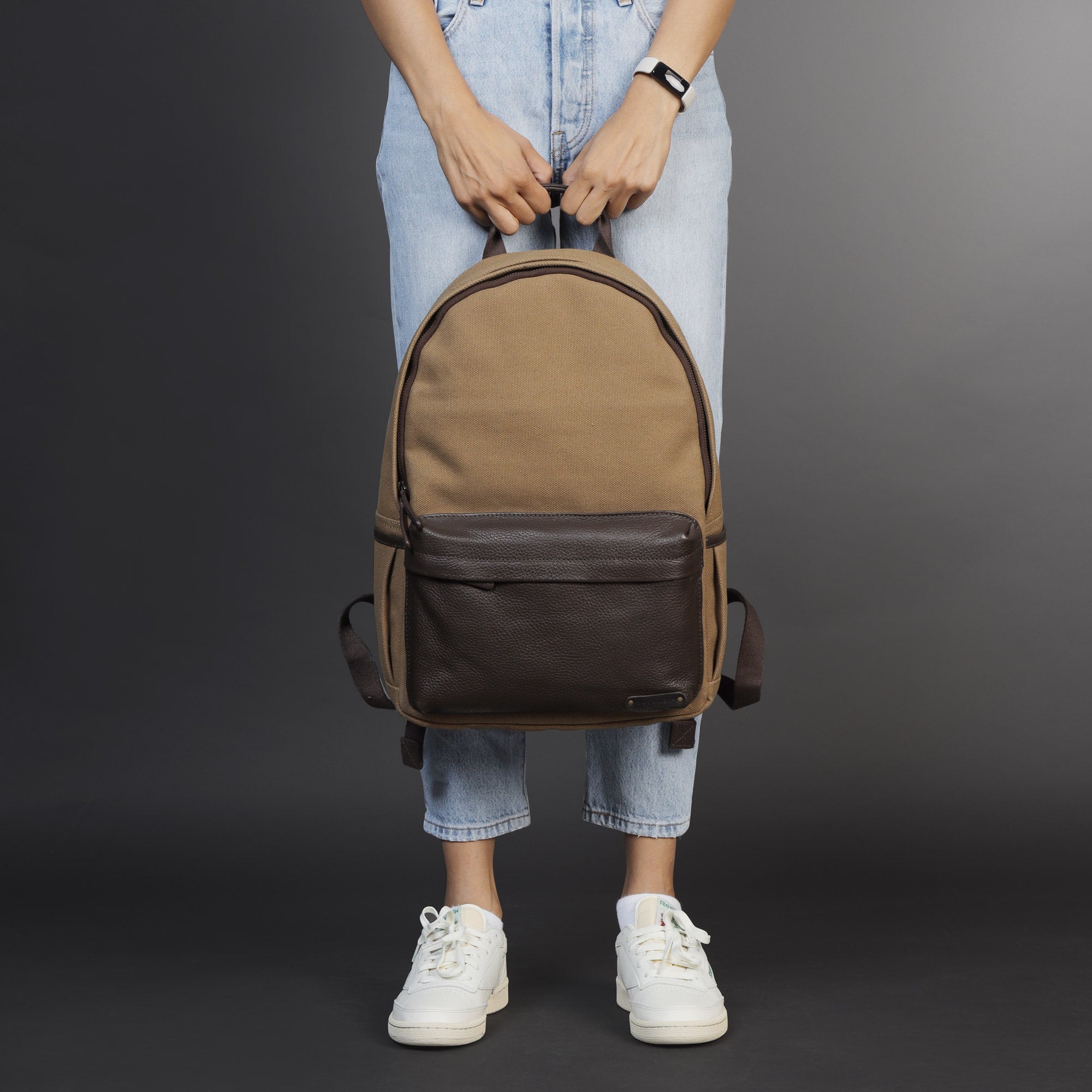 Journey Canvas Backpack featuring padded laptop section, multiple pockets, and durable water-resistant material.