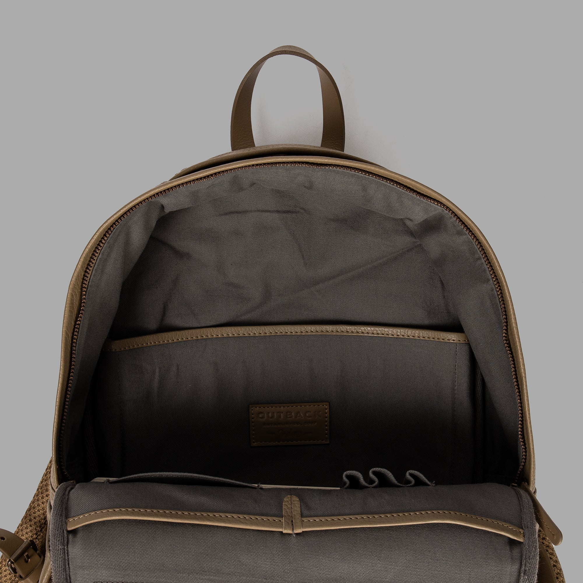 Journey Leather Backpack made from premium full grain leather with multiple pockets and padded laptop compartment.