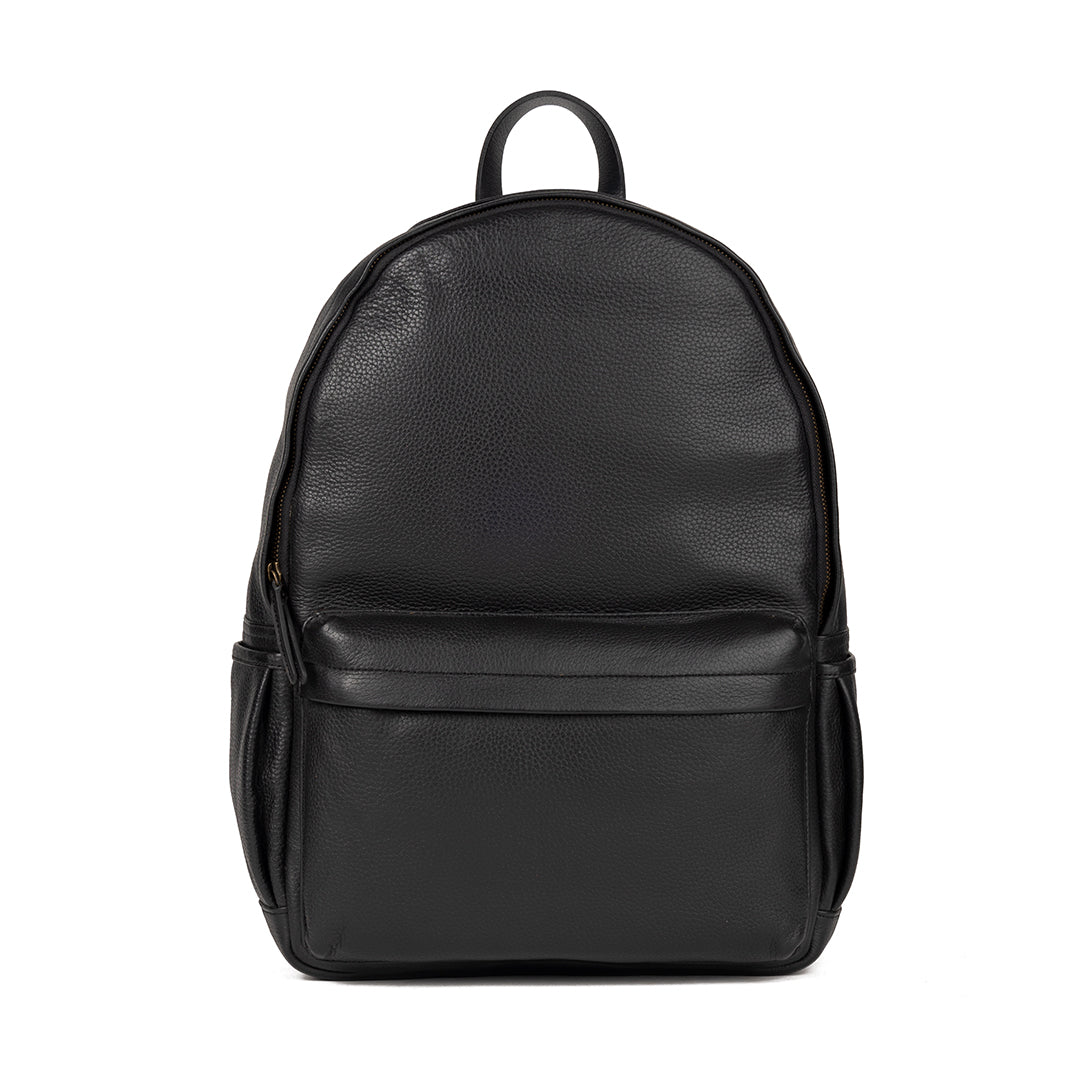 A stylish Journey Leather Backpack made from premium full grain leather, featuring multiple pockets and a padded laptop compartment.