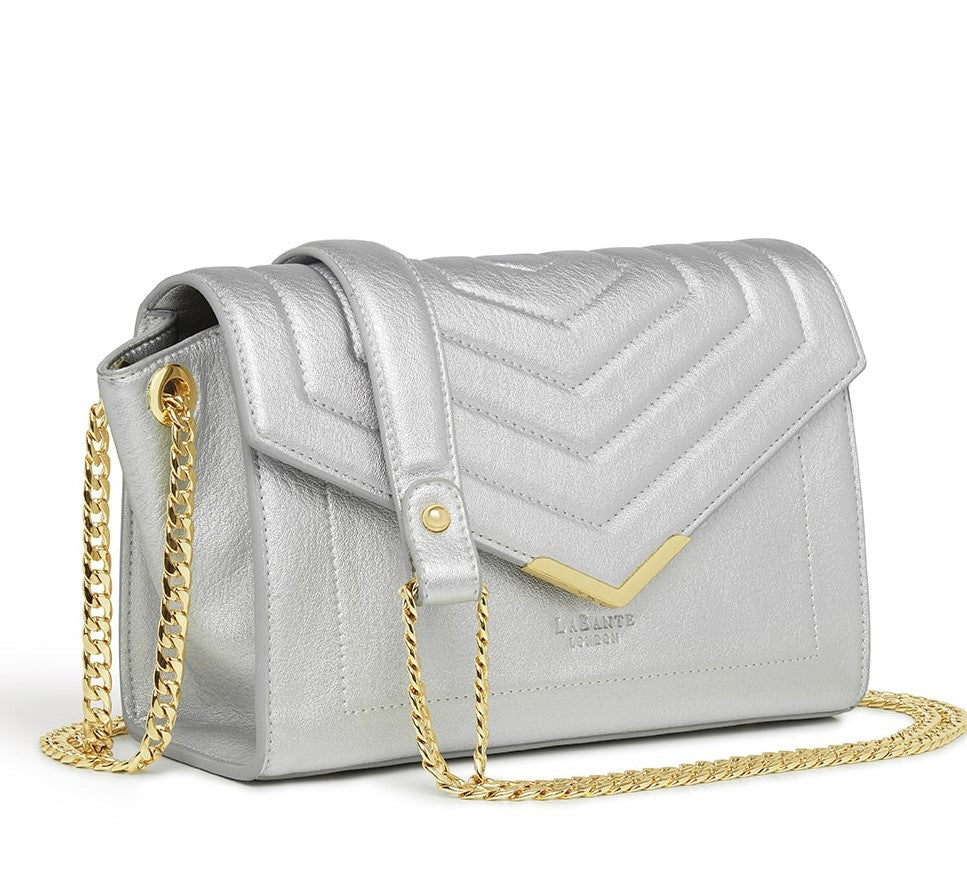 Kensington Silver Vegan Cross Body Bag with double gold chain strap and V-shape quilting design.