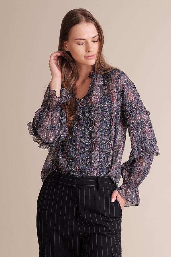 Kiara raglan sleeve pleated blouse in silk chiffon with kaleidoscope print and ruffle details on sleeves.