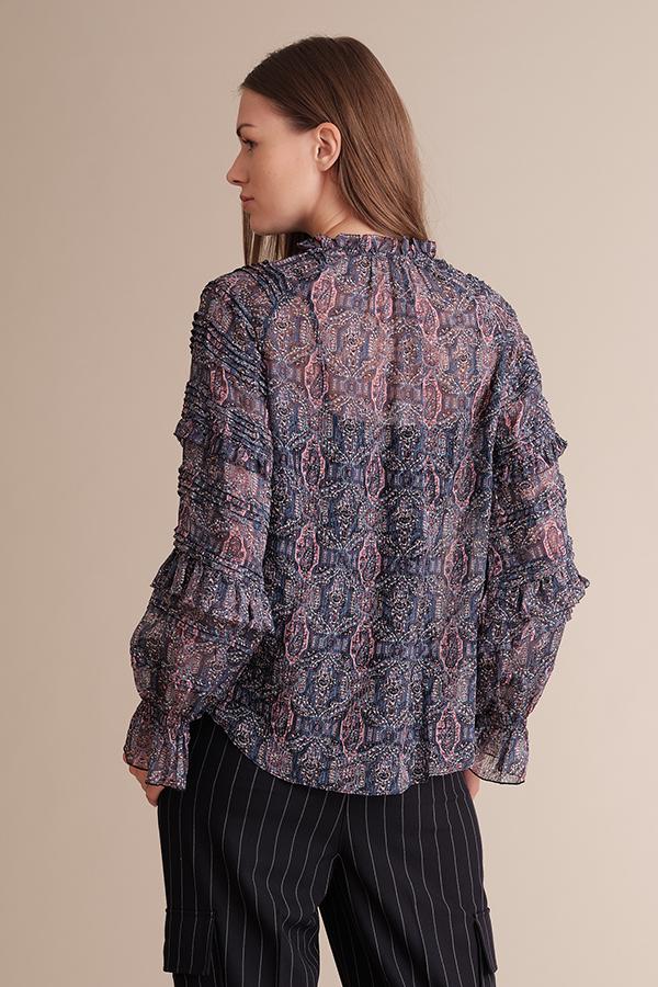 Kiara raglan sleeve pleated blouse in silk chiffon with kaleidoscope print and ruffle details on sleeves.