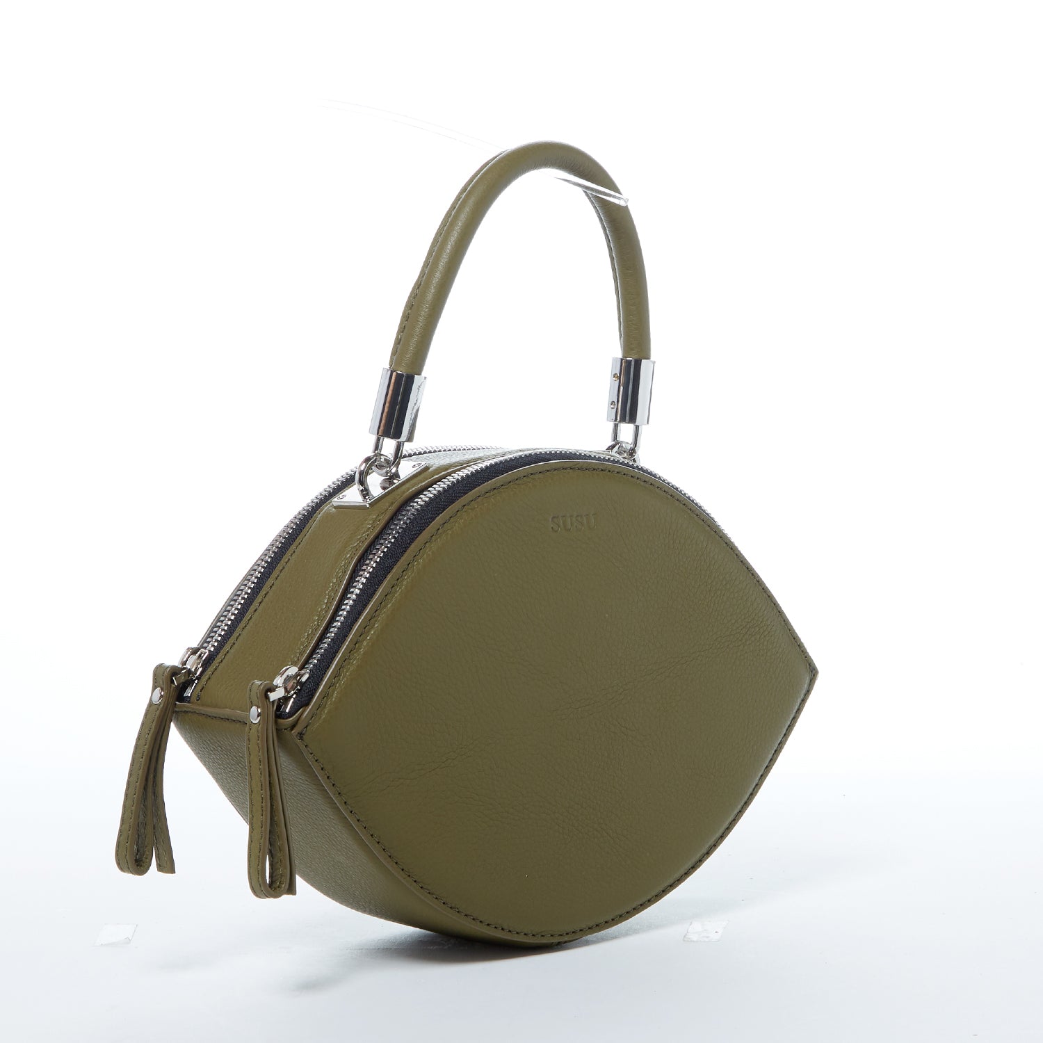 Olive green leather circle crossbody bag with silver hardware and teal lining, featuring adjustable strap and double zipper compartments.