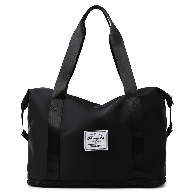 Korean style female short-distance portable travel bag in nylon, featuring a soft handle and square vertical section design.