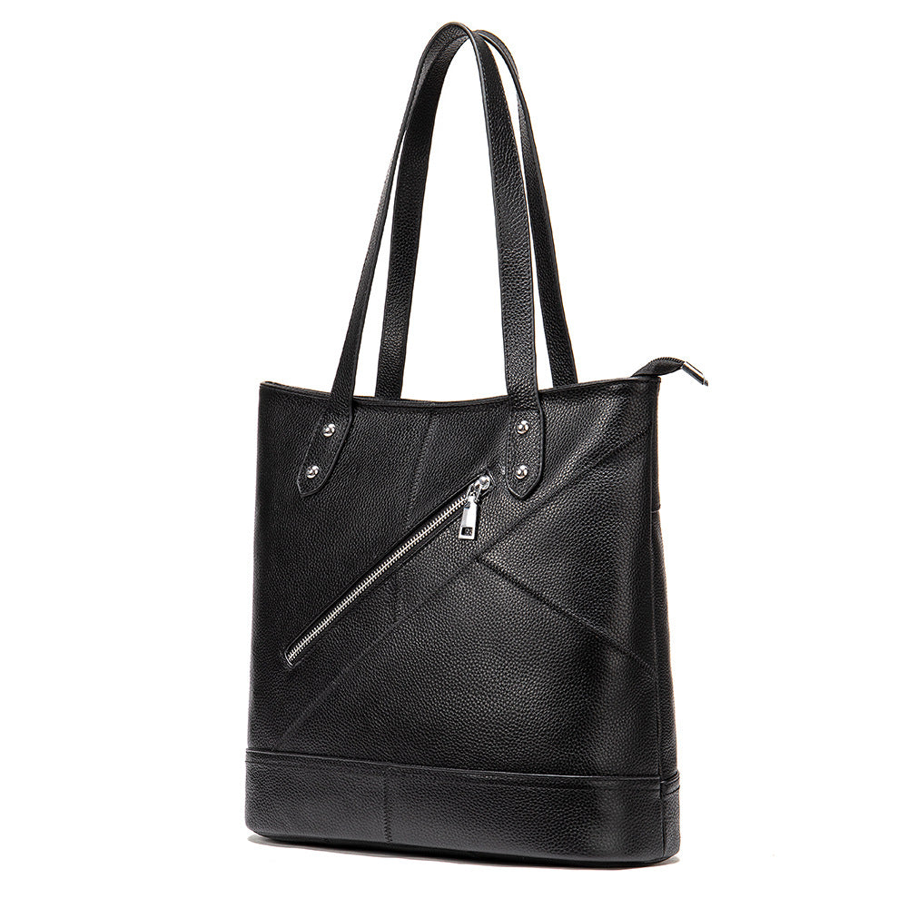 A stylish Ladies Casual Large Capacity Leather Bucket Handbag made from first layer cowhide, featuring a soft surface and secure zipper opening.