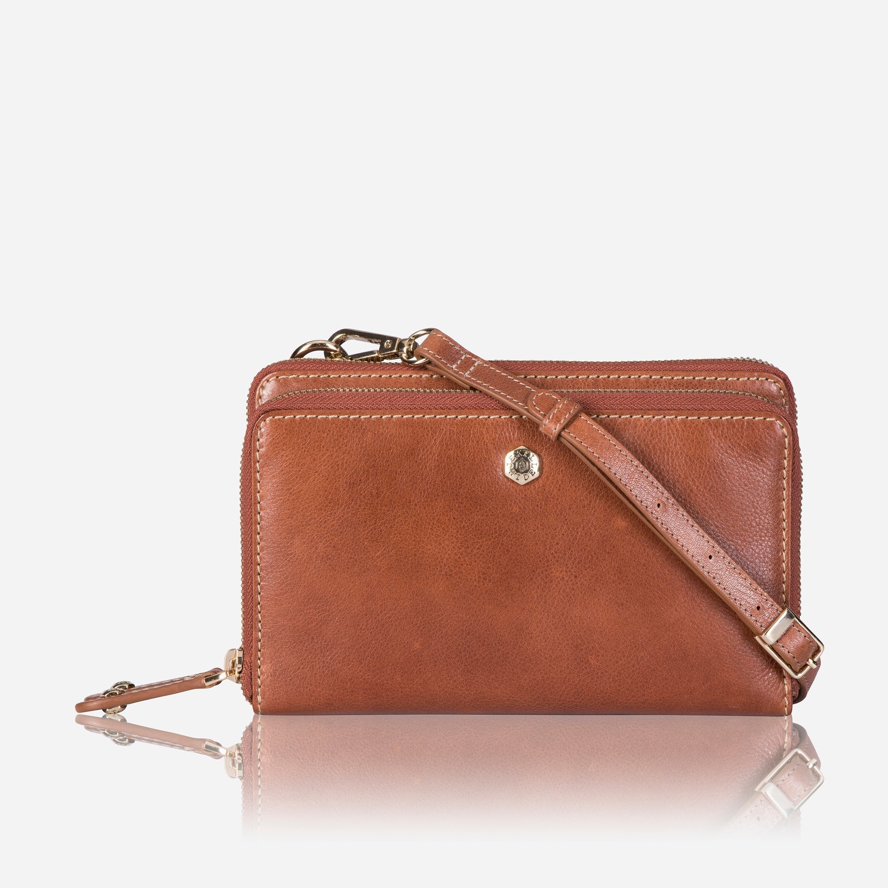 Stylish tan ladies purse with detachable strap, featuring multiple compartments for organization.