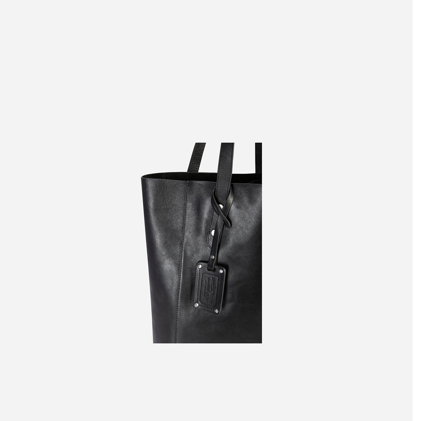 A stylish black ladies shopper handbag, showcasing its elegant design and spacious interior, perfect for daily use.