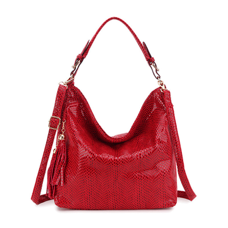 Lady's Casual Solid Color Snake Pattern Shoulder Bag in a stylish bucket shape with a zipper closure, featuring a trendy snake pattern design.