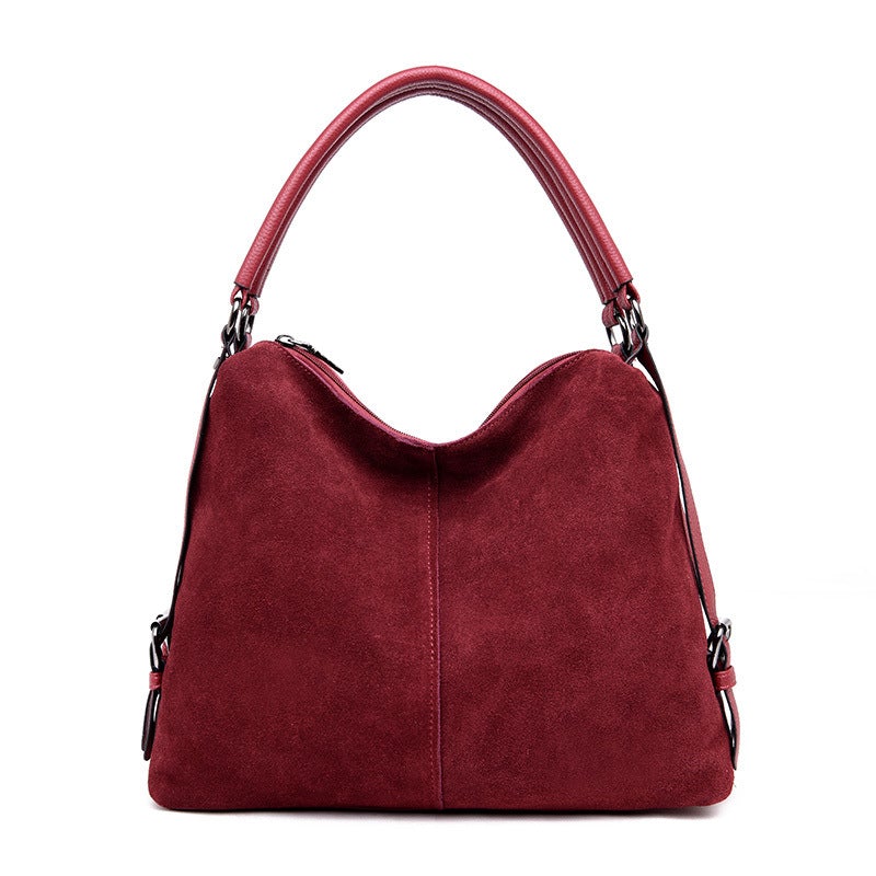 Lady's Dumpling Shape One-shoulder Messenger Bag in stylish design, featuring a soft PU exterior and spacious interior with multiple pockets.