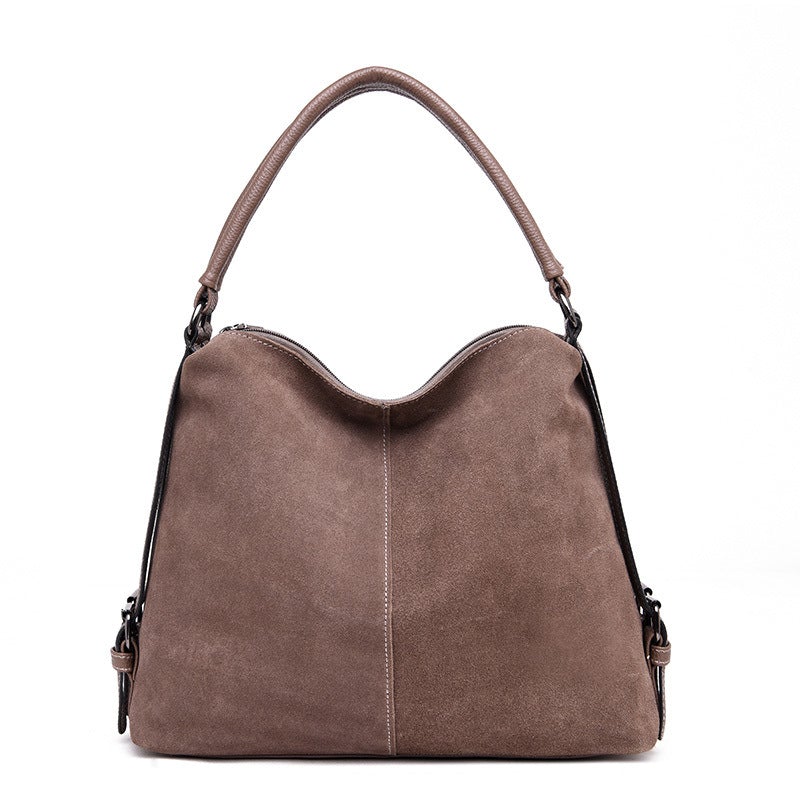 Lady's Dumpling Shape One-shoulder Messenger Bag in stylish design, featuring a soft PU exterior and spacious interior with multiple pockets.