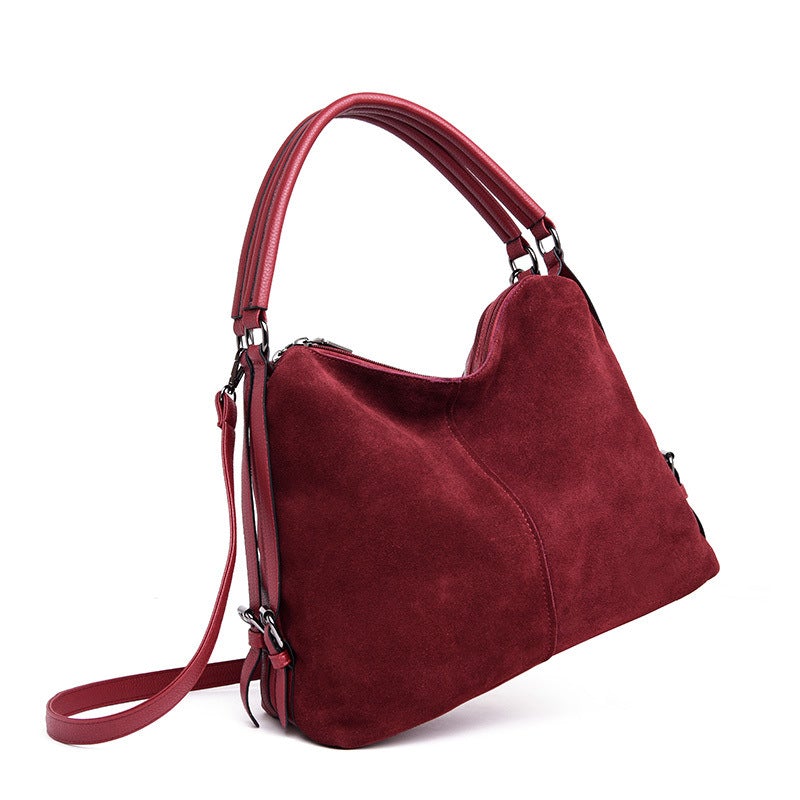 Lady's Dumpling Shape One-shoulder Messenger Bag in stylish design, featuring a soft PU exterior and spacious interior with multiple pockets.