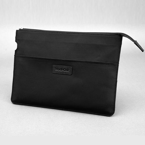 Wool & Oak 13" laptop sleeve with padded compartment and quick charge slot, featuring three exterior pockets for office essentials.