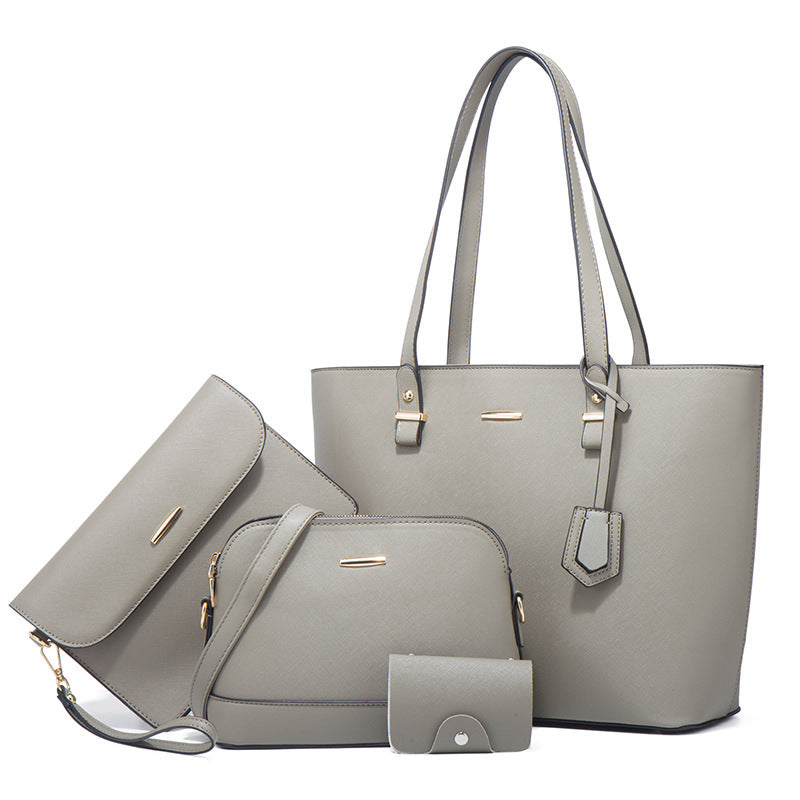 Large Capacity Fashion Four-Piece Handbag Suit featuring four stylish bags in various sizes, made from durable PU material.