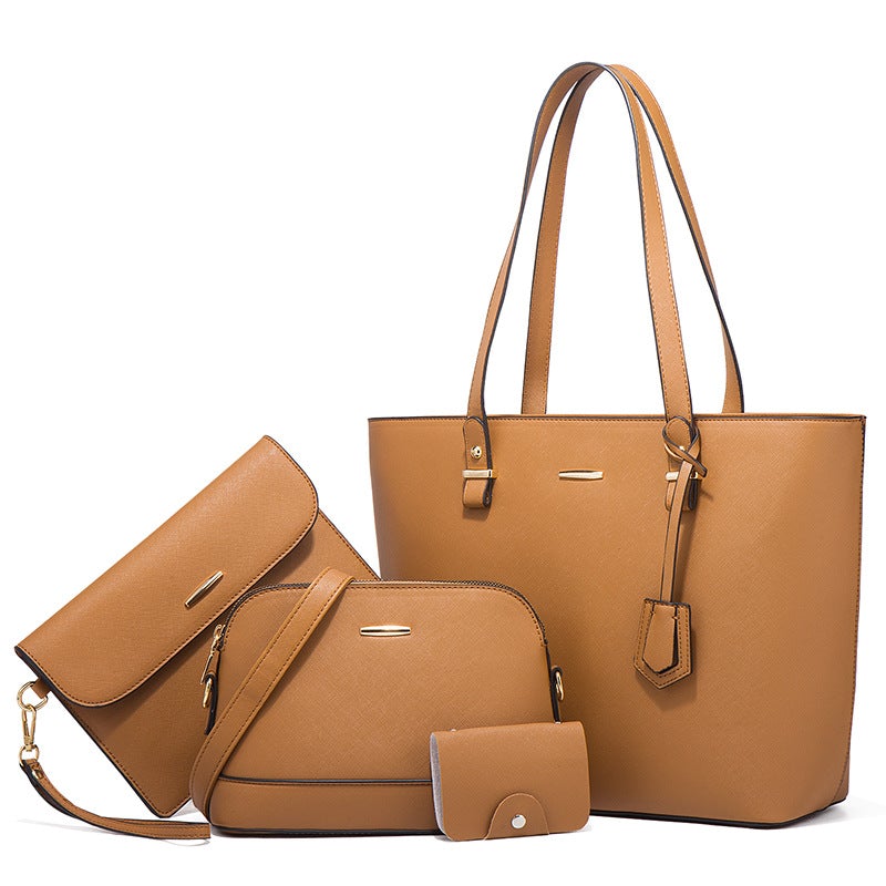 Large Capacity Fashion Four-Piece Handbag Suit featuring four stylish bags in various sizes, made from durable PU material.