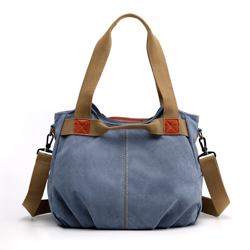 Large Capacity Simple Solid Color Multifunctional Canvas Bag in various colors, showcasing its spacious design and durable fabric.